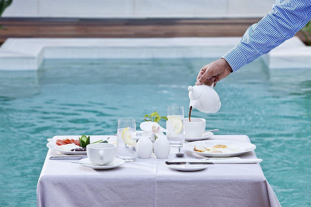 Palazzo Rimondi Boutique Hotel Ájosz Andóniosz Étterem fotó